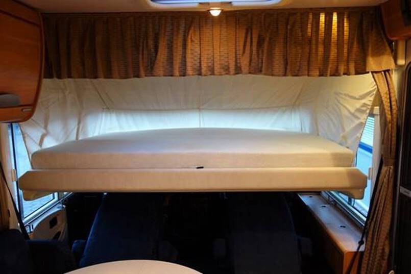 Hymer B 514 G compacte 4 pers. camper met garage 32