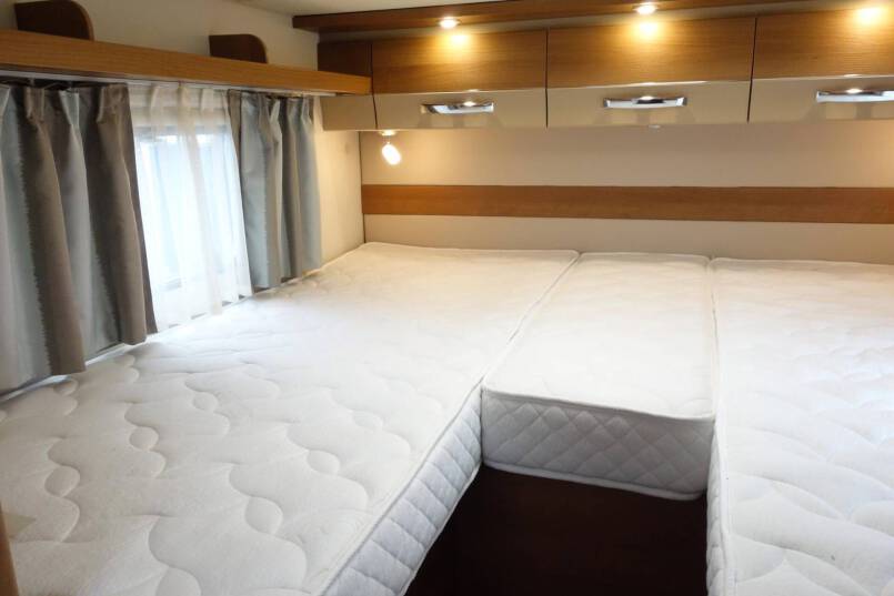 Knaus TI 600 compact, 2 aparte bedden, garage 25