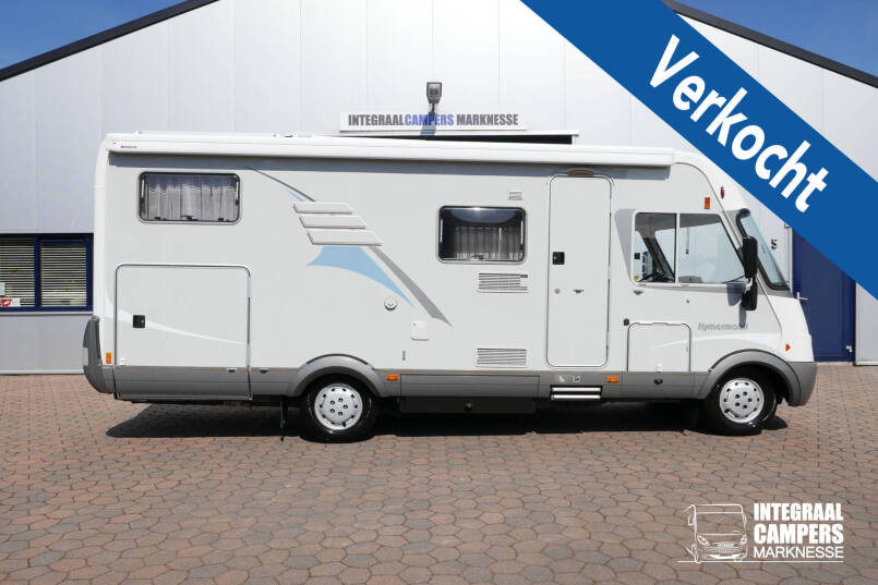 Hymer B 674 G L-zit, enkele bedden, bovenkastjes cabine, grote garage 0